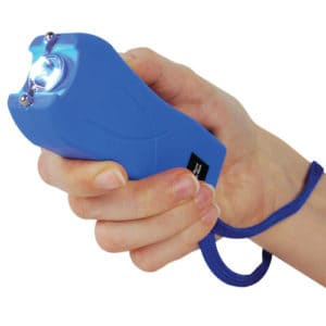Runt Rechargeable Stun Gun With Flashlight And Wrist Strap Disable Pin in hand view - BLUE