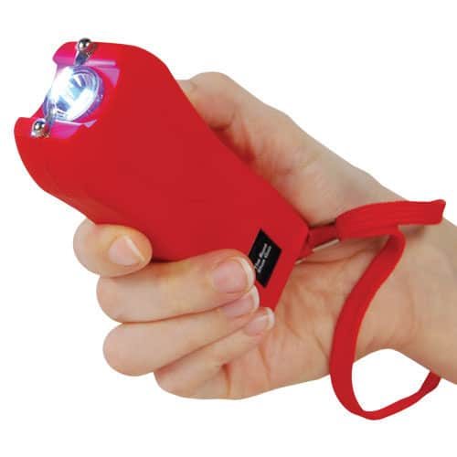 Runt Rechargeable Stun Gun With Flashlight And Wrist Strap Disable Pin in hand view - RED