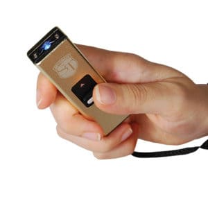 Slider Stun Gun LED Flashlight USB Recharger in hand view - GOLD