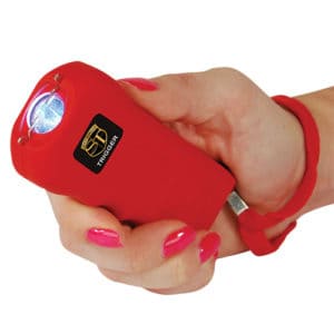 Trigger Stun Gun Flashlight with Disable Pin in hand view - RED